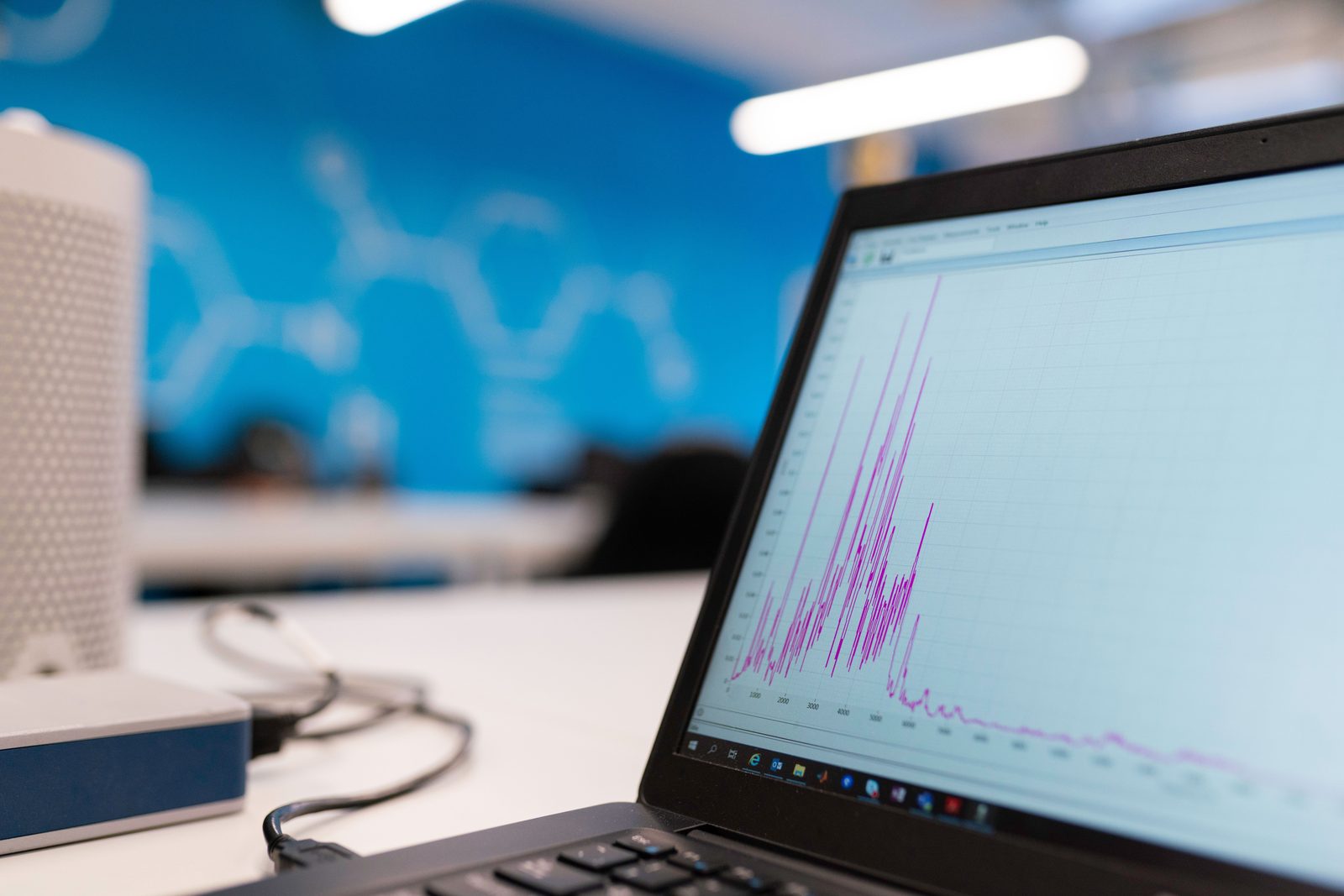 Laptop screen displaying analytics and performance charts.